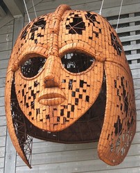 Modern image of helmet at the Sutton Hoo exhibition centre