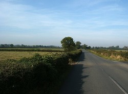 Looking along Fenn Lanes Roman road from near Apple Orchard Farm westward towards the site of the marsh.