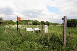 INterpretation panels, marker and modern monument adjacent to parking area, looking towards Grenvile monument
