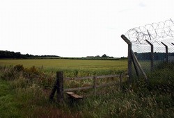 Looking north east, from the footpath by the RAF depot, with the ground rising gently up into Heathyards in the distance.