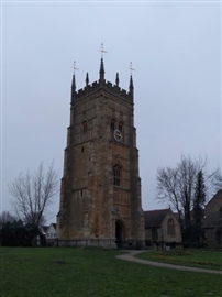 Evesham bell tower, which has bullet impact scars from fighting in the Civil War
