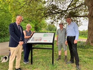 Lord Berkeley, Lesley Hewish, Adam Dolling and Roland Brown with the new information board.