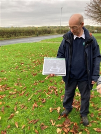 Battle of Winwick Society member Richard Ward showing the initial design of the monument on Hermitage Green. Photo: Paul Wright