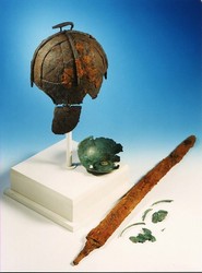 The Anglo-Saxon helmet, sword and hanging bowl of the 7th century found near Wollaston, Northamptonshire in 1997.